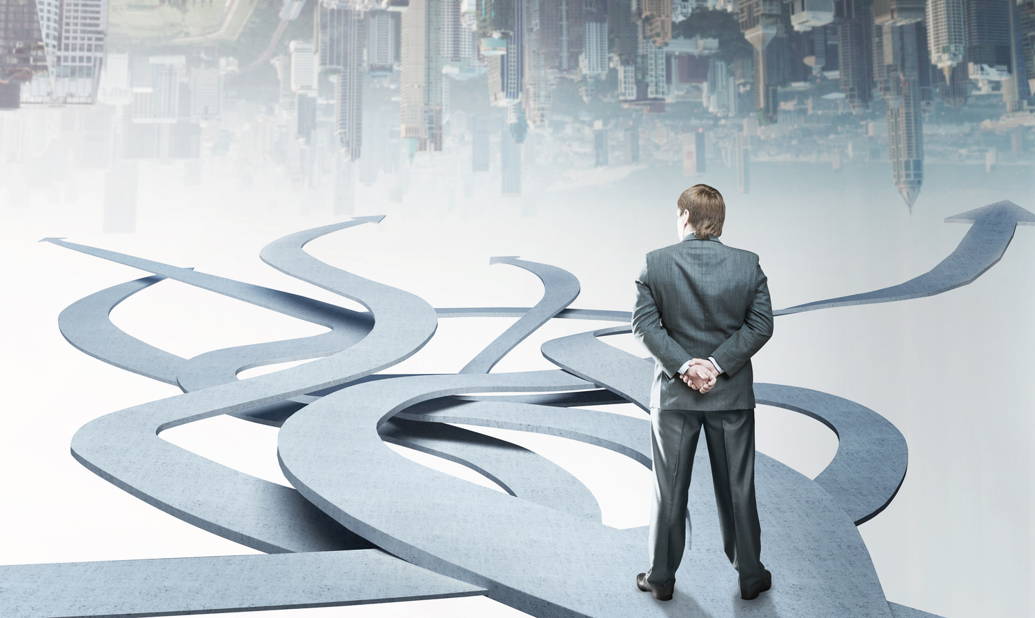 Businessman Standing on Roads Choosing His Way